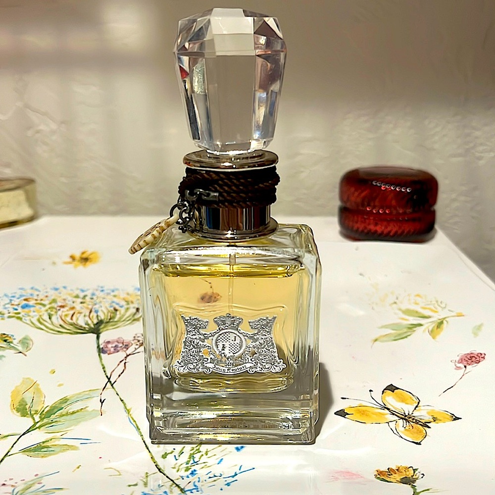 Juicy Couture Parfum 1.7 fl oz. price is firm